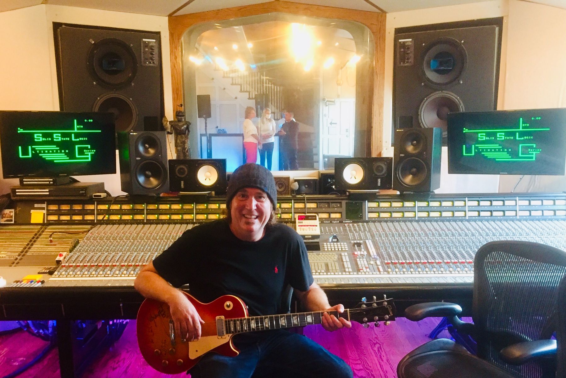 In the studio with a Les Paul at the console